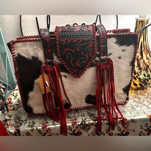Cowhide with Red and Black Leather